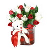 15 tulips and a teddy bear in a glass vase