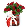 12 roses and a teddy bear in a glass vase
